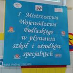 Plakat z napisem I Wojewódzkie Zawody Pływackie szkół i ośrodków specjalnych.