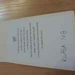 Rozłożona kartka z życzeniami wpisanymi przez ucznia.