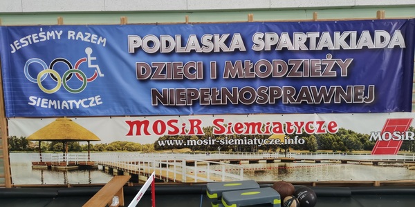 Baner z napisem XII Podlaska Spartakiada Dzieci i Młodzieży Niepełnosprawnej "Jesteśmy Razem'