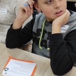 Uczeń rozwiązujący zadanie konkursowe