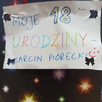 Plakat z napisem 